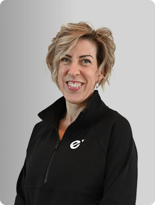 Rebecca Barnett, MSN, APRN, ACNS-BC, A-GNP-C, AOCNP, Nurse Practitioner at Fem Excel, smiling in black zip-up jacket.