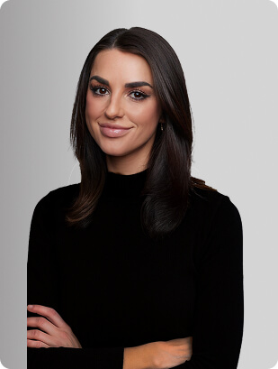 Andrea Mayfield, MSN, APRN, FNP-C, Nurse Practitioner at Fem Excel, smiling in black medical uniform.