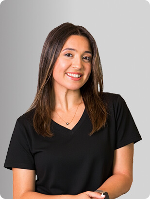 Diana Rivero, MSN, FNP-BC, Nurse Practitioner at Fem Excel, smiling in black medical uniform.