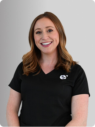 Rosalie Sirianno, FNP, Nurse Practitioner at Fem Excel, smiling in black medical uniform.