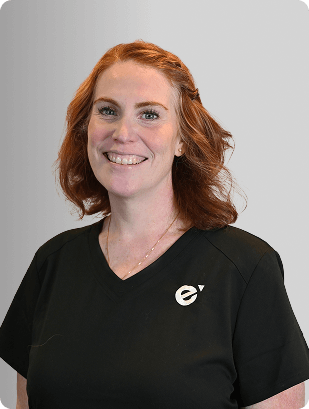 Daneille Bint, APRN, FNP-C, Nurse Practitioner at Fem Excel, smiling in black medical uniform.