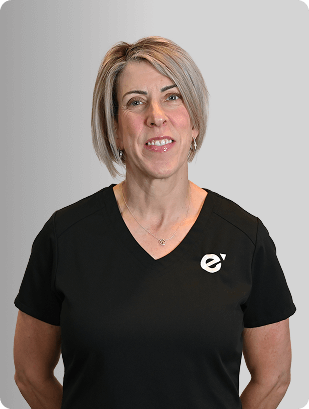 Rebecca Barnett, MSN, APRN, ACNS-BC, A-GNP-C, AOCNP, Nurse Practitioner at Fem Excel, smiling in black zip-up jacket.