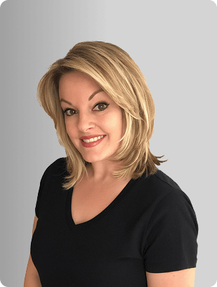 Jeni-Lyn Calabro, APRN, Nurse Practitioner at Fem Excel, smiling in black medical uniform.