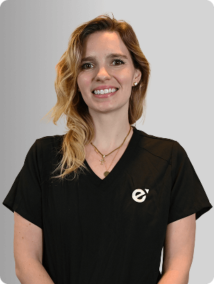 Lauren Duffy, DNP, APRN, FNP-C, Nurse Practitioner at Fem Excel, smiling in black medical uniform.