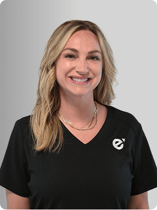 Grace Oropesa, MSN, APRN, FNP-C, Nurse Practitioner at Fem Excel, smiling in black medical uniform.