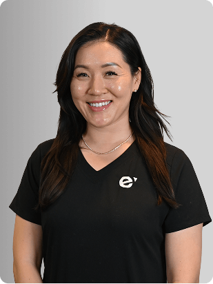 Jenny W. Song, MS, FNP-BC, Nurse Practitioner at Fem Excel, smiling in black medical uniform.