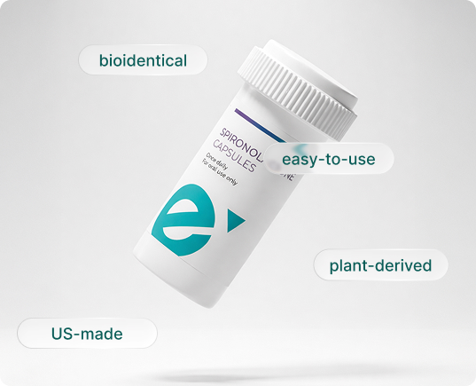 Spironolactone Oral Medication, floating against a grey background, a teal logo on the Label.