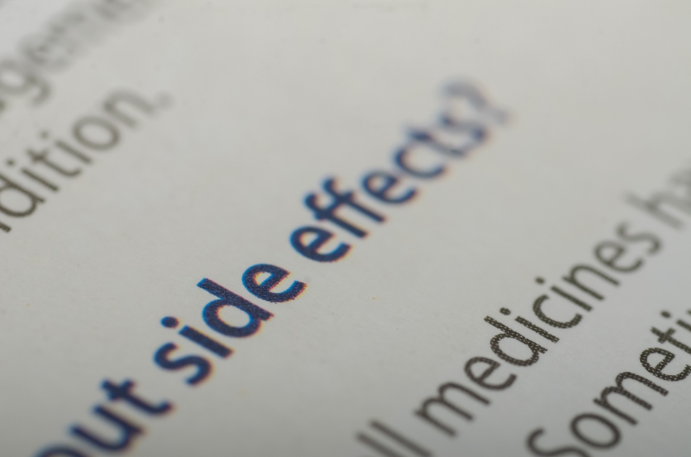 The phrase side effects written in blue text on white background
